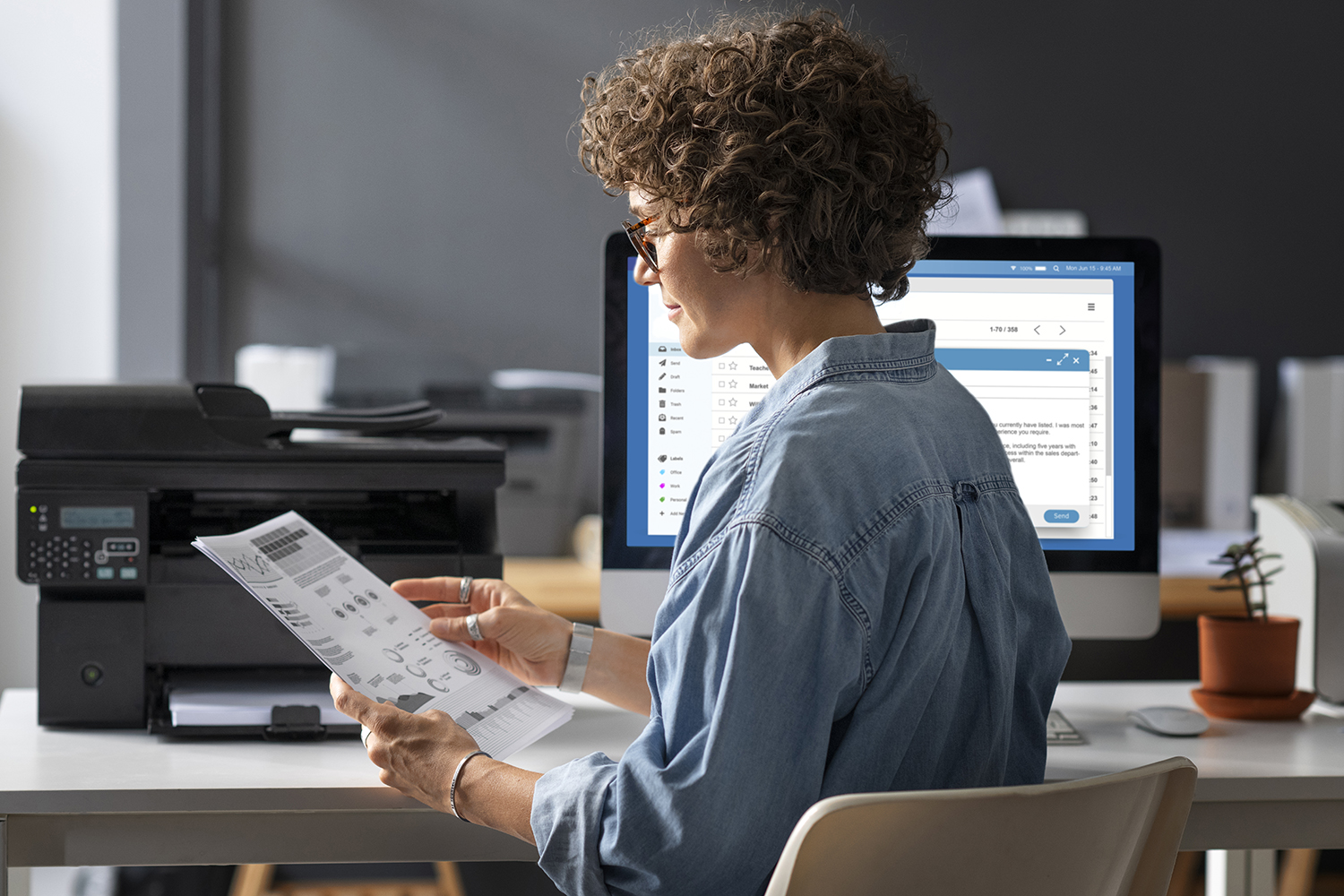 woman-sitting-desk-medium-shot
